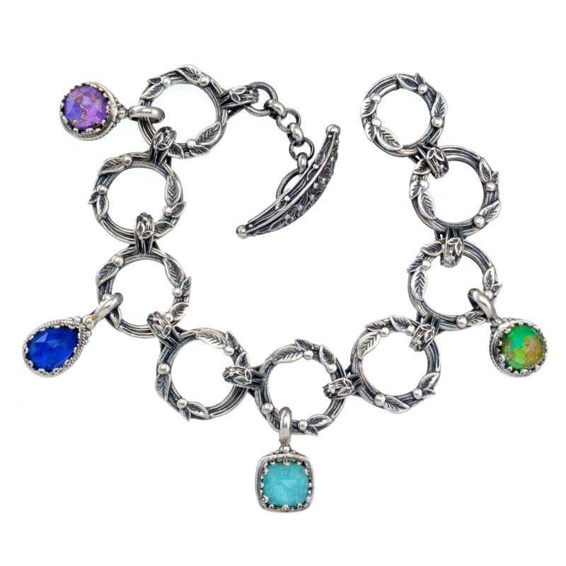Gerochristo sterling silver multi color charm bracelet.